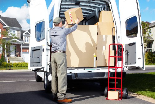 Removal team planning a house move in Docklands near modern apartment buildings