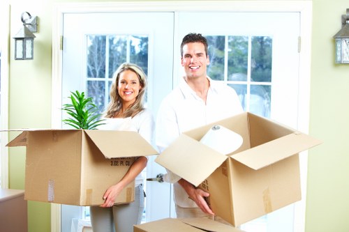 Careful handling of household items during a Docklands flat move